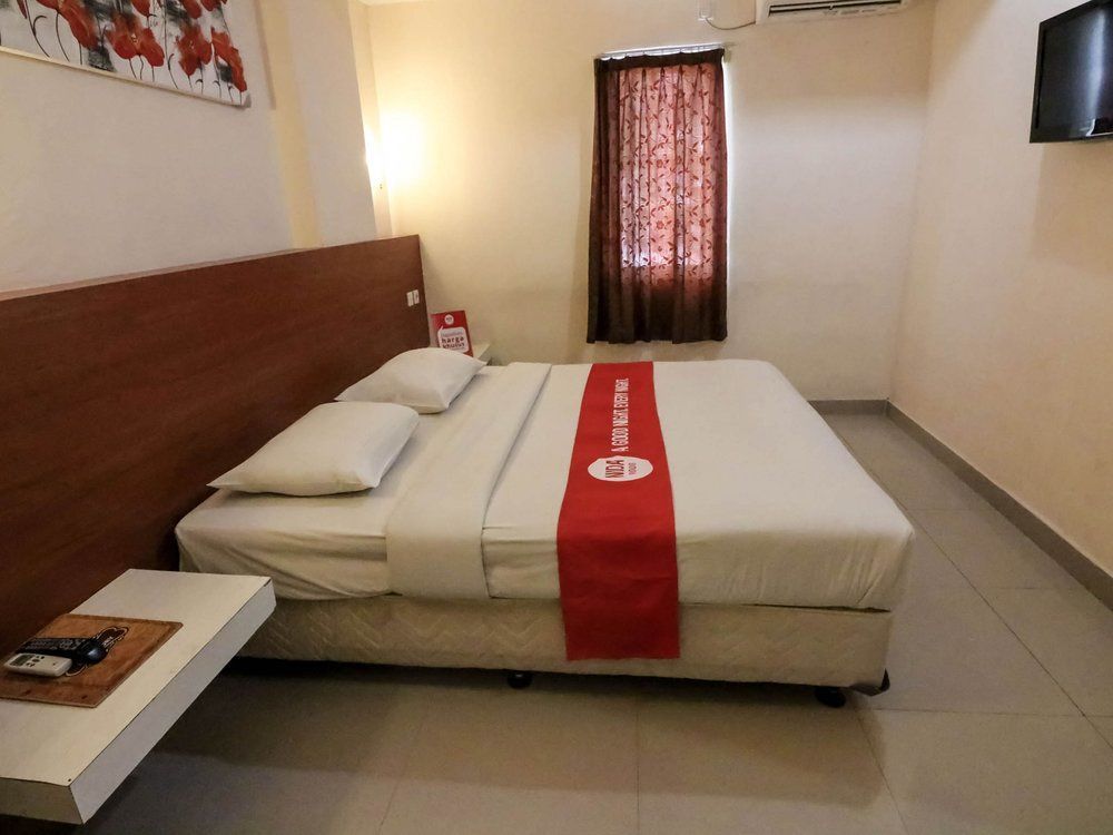 Отель Reddoorz @ Raya Kuta Кута Экстерьер фото